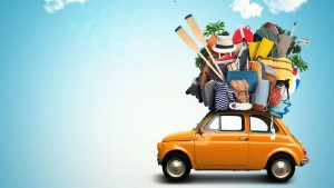 Bagagli sul tetto dell'auto, cosa dice il Codice della Strada